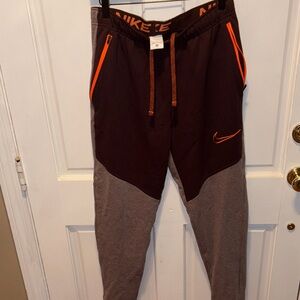 Nike Burgundy Sweatpants Pants with Orange Details. Mens size Medium